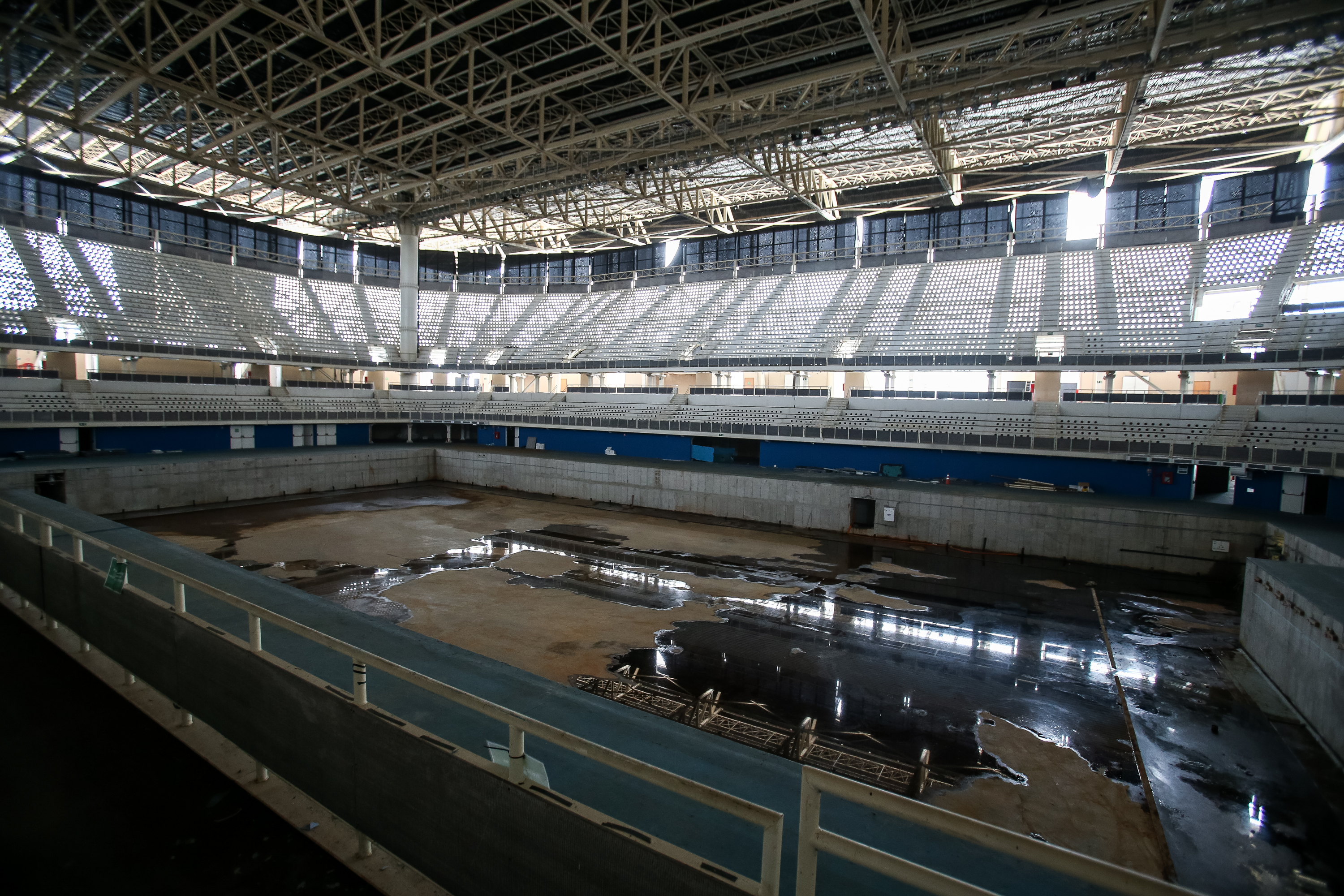 A view from the mostly abandoned Olympic Aquatics stadium at the Olympic Park on May 20, 2017 in Rio de Janeiro, Brazil. In the nine months after the Olympic games, very few events have been organised in the Olympic Park venues. The Olympic Aquatics stadium was to be dismantled, but it continues abandoned with no obvious signs of dismantlement. In addition, numerous areas of standing water can be found inside and outside the venue in the former official and training pools, making them dengue and zika risk areas.