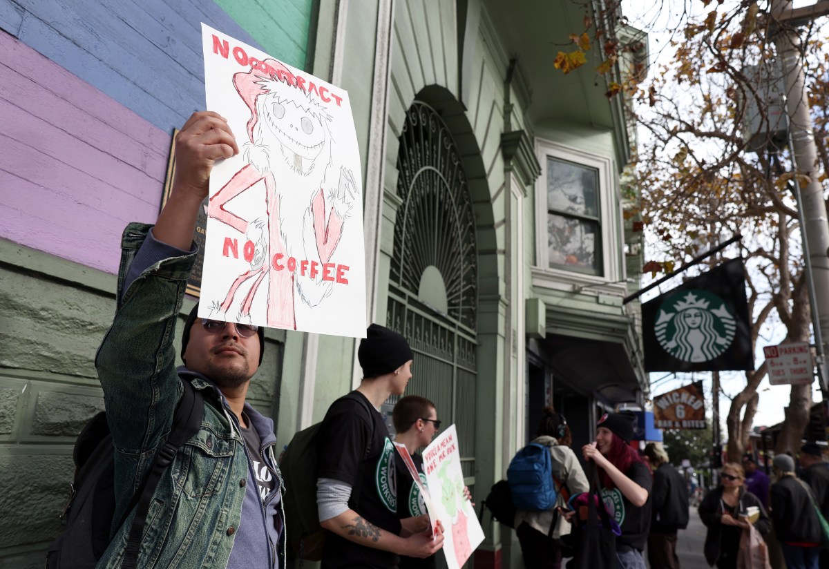 Thousands of Starbucks workers strike on Red Cup Day : NPR