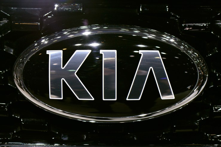 The old Kia logo is seen during the Geneva Motor show in 2013