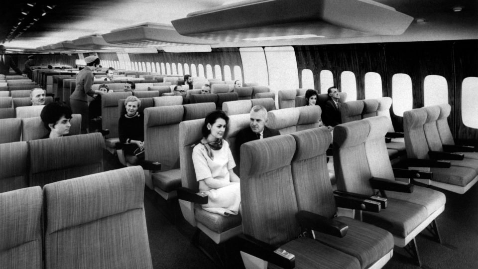 Passengers sit in a model of an Air France Boeing 747 Jumbo Jet interior in 1966. 