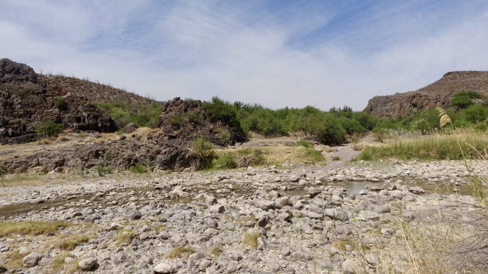An area of dry Rio Grande riverbed. Because the Rio Grande is a binational river, it is managed jointly by Mexico and the U.S. 