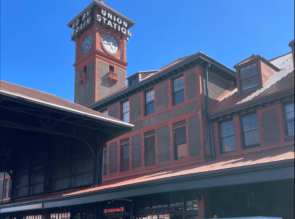 Red and grey brick facade of Union Station in Portland, Oregon.